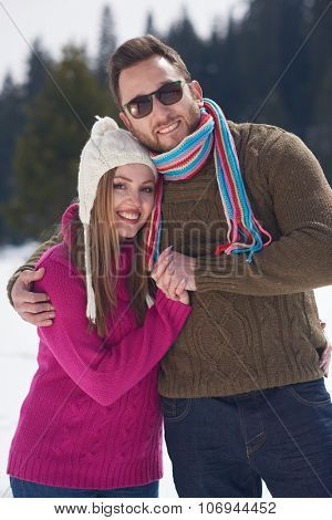portrait of happy young romantic tourist  couple outdoor in nature at winter vacation
