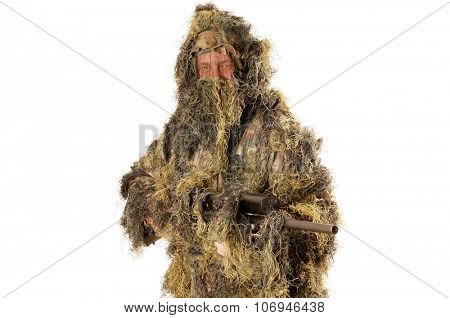 Man in Ghillie suit with sniper rifle isolated on white