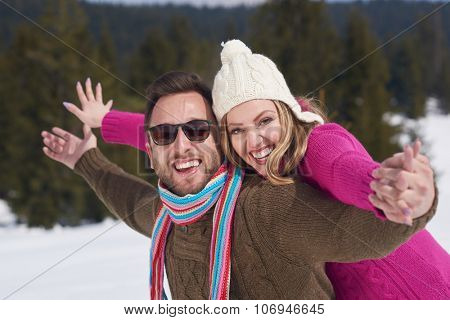 portrait of happy young romantic tourist  couple outdoor in nature at winter vacation