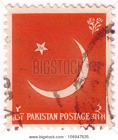 Pakistan - Circa 1961: A Stamp Printed In Pakistan Shows Star And Crescent Moon, Circa 1961.