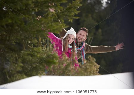 portrait of happy young romantic tourist  couple outdoor in nature at winter vacation