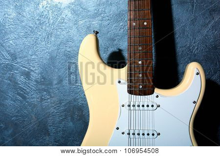Guitar on blue background