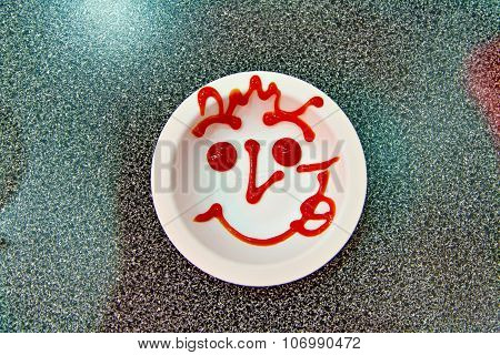 Sauce's smile on dish