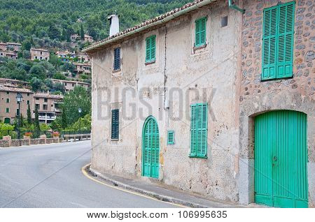 Green window shutters