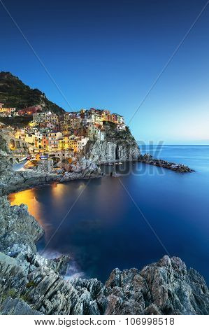 Manarola Village, Rocks And Sea At Sunset. Cinque Terre, Italy