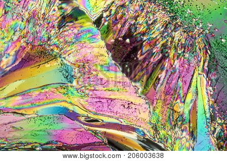 colorful microscopic shot of Trisodium citrate microcrystals in polarized light