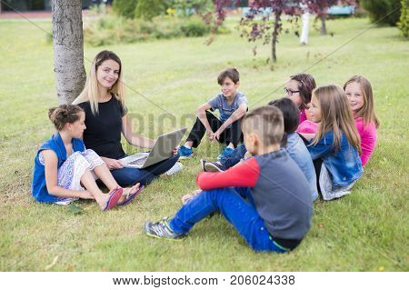 The Great Portrait Of School Pupil Outside Classroom Carrying Bags