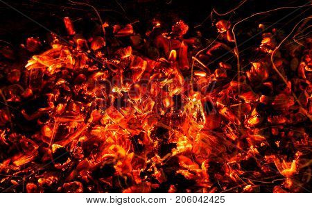 background of burning coals . Photo of an abstract texture