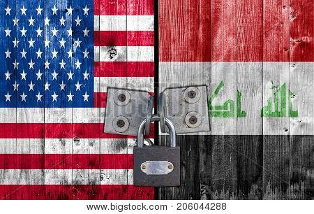 US and Iraq flag on door with padlock