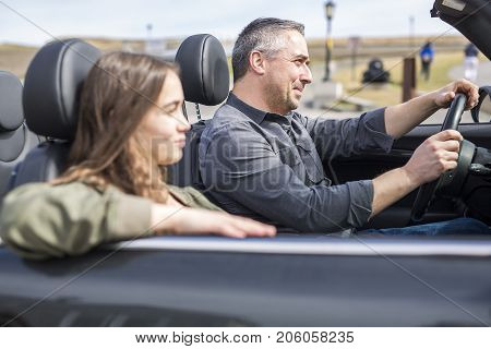 A Father On Car Journey With Teenage daughter