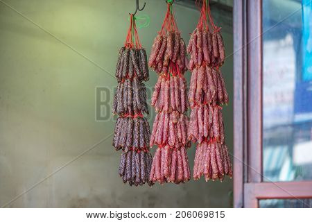 Hanging Chinese sausace in front of store of China town Thailand