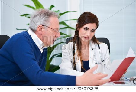 Doctor talking to his patient