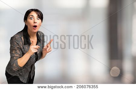 Conceited woman portrait, bright background