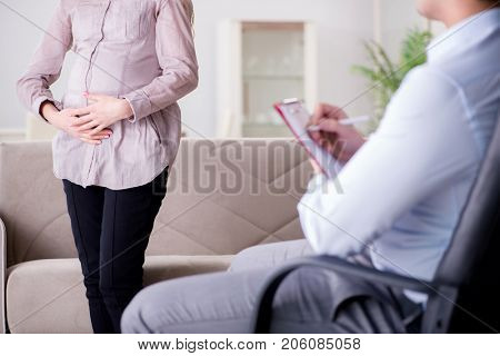 Pregnant woman visiting psychologist doctor