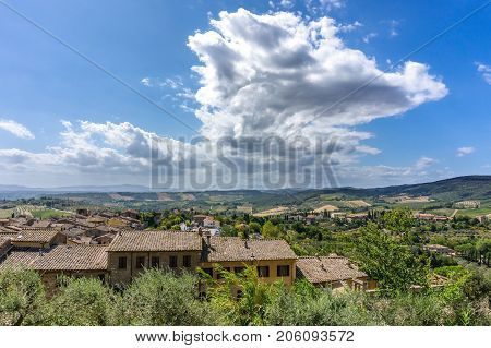 View Into Tuscany Landscape Over The Roofs Of Old Town