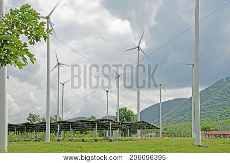 Wind energy nature(wind, energy, windmill, turbine, power, nature, green, renewable, sky, electricity, environment, generator, mill, alternative, technology, landscape, plant, electric, environmental, blue, solar, field, industrial, farm, generation, indu