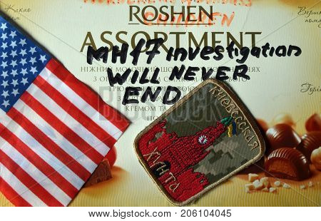 ILLUSTRATIVE EDITORIAL. Chevron of Ukrainian Army. With logo Roshen Inc. Trademark Roshen is property of Ukrainian president Poroshenko. MH17 flight investigation. Kiev,Ukraine.September 10, 2017