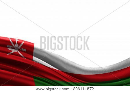 Grunge colorful flag Oman with copyspace for your text or images,isolated on white background. Close up, fluttering downwind.