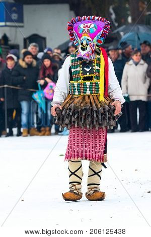 Razlog, Bulgaria - January 14, 2017: People in traditional carnival kuker costumes at Kukeri festival Starchevata