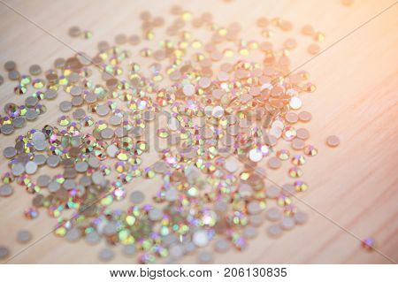 Crystals. Crystal strasses on a white background. Beautiful shiny sparkling pink rhinestones isolated diamond fashion gems jewelery precious strass. Jewelry rhinestones shiny stones.
