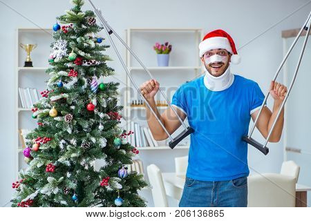 Injured man celebrating christmas at home