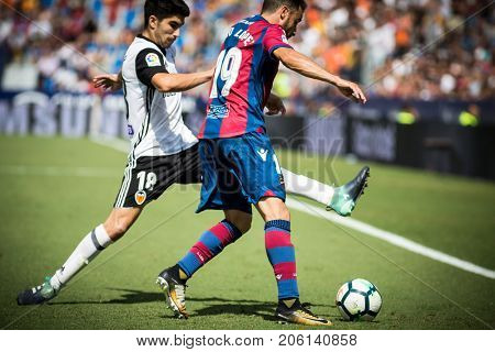 VALENCIA, SPAIN - SEPTEMBER 16: Pedro Lopez with ball during Spanish La Liga match between Levante Ud and Valencia CF at Ciutat de Valencia Stadium on September 16, 2017 in Valencia, Spain