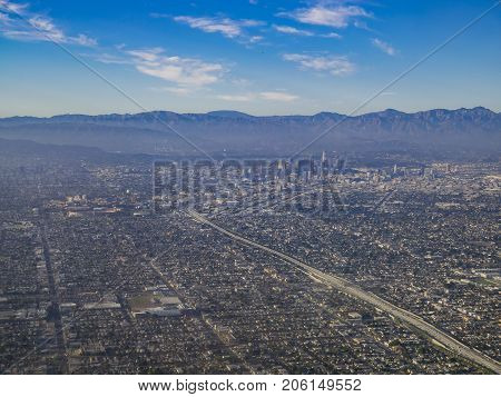 Aerial View Of Downtown, View From Window Seat In An Airplane