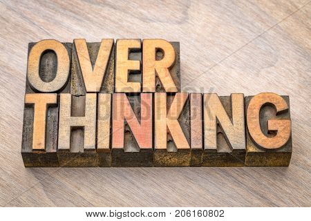 overthinking word abstract in vintage letterpress wood type printing blocks