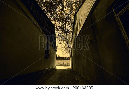 An Alley Way Between Two Buildings At Night Time In Gazakh Azerbaijan