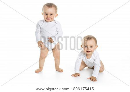 The Two identical twins on a white isolated background