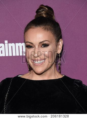 LOS ANGELES - SEP 15:  Alyssa Milano arrives for the Entertainment Weekly Pre Emmy Party on September 15, 2017 in West Hollywood, CA                