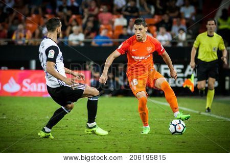 VALENCIA, SPAIN - SEPTEMBER 19: Ricca with ball during Spanish La Liga match between Valencia CF and Malaga CF at Mestalla Stadium on September 19, 2017 in Valencia, Spain