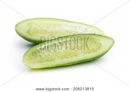 Fresh sliced cucumber isolated on white background. One sliced cucumber.