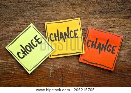 3C concept - choice, chance and change - handwriting in black ink on sticky notes against rustic, weathered wood