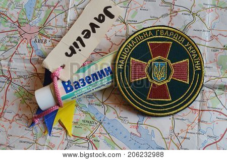 ILLUSTRATIVE EDITORIAL.Chevron of Ukrainian army. Javelin - USA FGM-148 anti-tank missile system,VASELINE - Petrolatum (RU). Kiev,Ukraine.September 22, 2017
