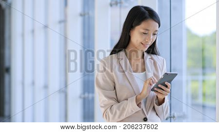 Professional Business woman looking at tablet computer