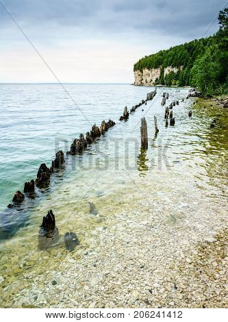 Remnants of docks in Fayette Historic Townsite in Michigan