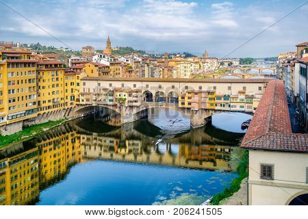 Aerial view of the city of Florence and the Ponte Vecchio, a medieval bridge over the river Arno
