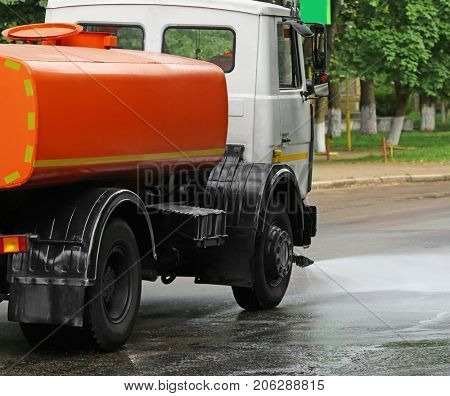 Municipal car for cleaning roads on city street