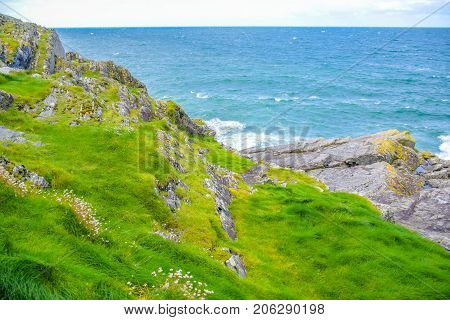 Landscape of Peel Hill rocky seashore in Isle of Man