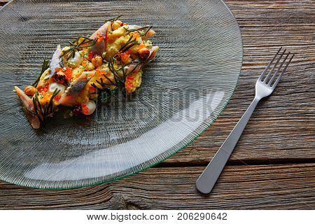 Smoked sardines salad with creamy cheese corn codium and hazelnuts