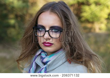 Portrait Of A Girl With Bright Make-up.