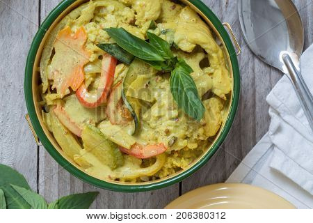 Yellow Thai Curry In A Bowl On Wooden Table
