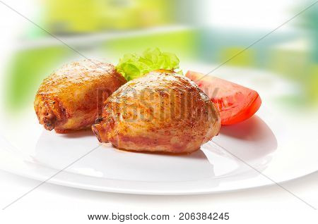 Grilled Chicken Drumsticks And Vegetables On White Background