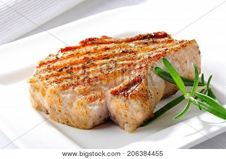 Grilled pork steak, isolated on the white background