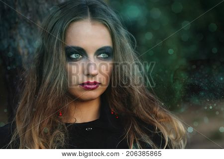 Portrait Of A Girl With Bright Make-up.