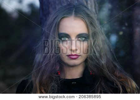 Portrait Of A Girl With Bright Make-up.