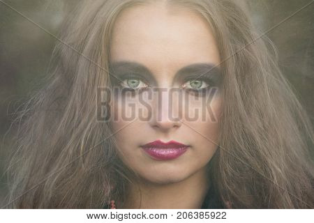 Portrait Of A Girl With Bright Make-up.
