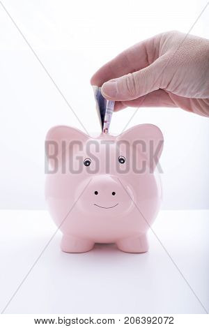 Piggybank With Hand And Notes