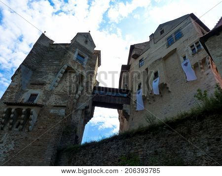 Pernstejn Castle is a castle on a rock above the village of Nedvedice some 40 kilometres 25 mi northwest of Brno in the South Moravian Region Czech Republic.